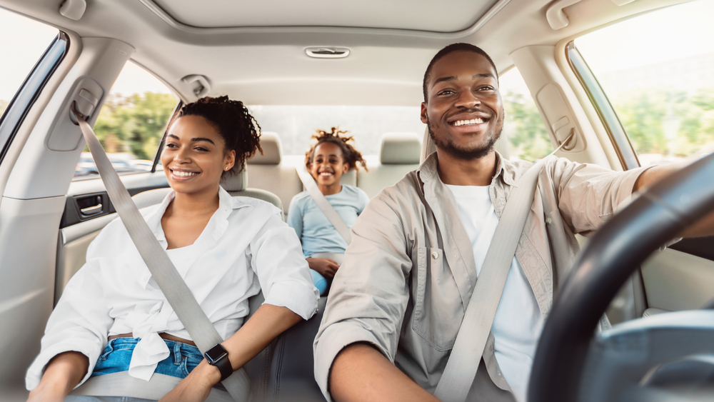 Happy,african,american,family,riding,car,traveling,by,automobile.,black